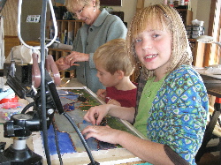 Michal gets help in workshop